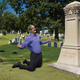 Image for article titled Weeping Tim Cook Spotted Screaming For Help At Steve Jobs’ Tombstone